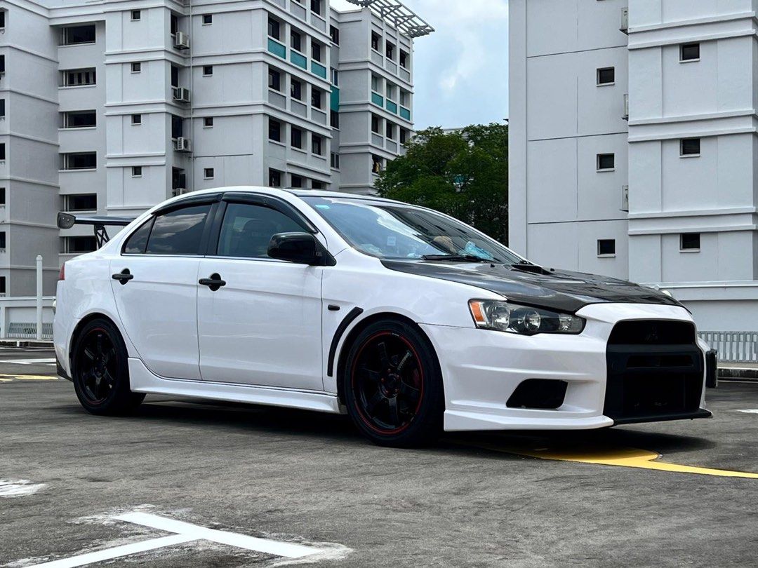 Mitsubishi Lancer EX 1.5 (A) (Category: Used Cars) located in Singapore. Submitted by g4me4lyfe (Listing ID 1323295613, Image 2). Description: Lancer Ex 1.5A Letting go of this beauty. my loss, your gain. Car is not fast but smooth. Car can be done up more and look 🔥 on the road. Easily service and parts are cheap 🙌🏻 Things have been done on car, 1. Quite a few undercarriage parts changed. 2. HKS with cert 3. Recaro Semi Bucket seats (only fro