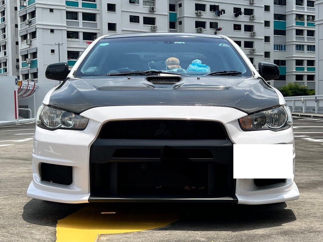 Mitsubishi Lancer EX 1.5 (A) (Category: Used Cars) located in Singapore. Submitted by g4me4lyfe (Listing ID 1323295613, Image 1). Description: Lancer Ex 1.5A Letting go of this beauty. my loss, your gain. Car is not fast but smooth. Car can be done up more and look 🔥 on the road. Easily service and parts are cheap 🙌🏻 Things have been done on car, 1. Quite a few undercarriage parts changed. 2. HKS with cert 3. Recaro Semi Bucket seats (only fro