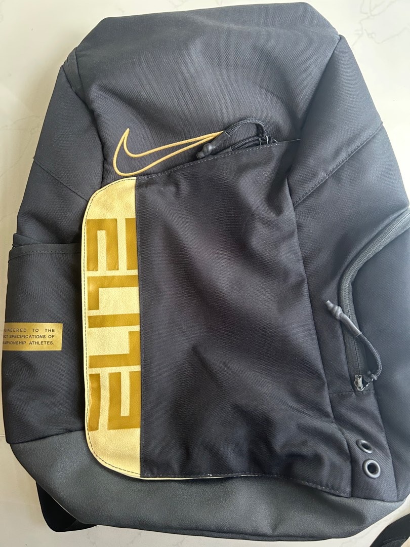 black and gold nike bag