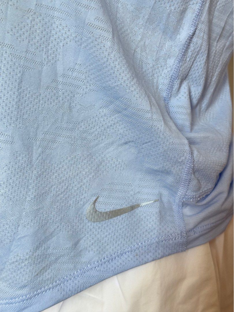 NIKE SPORTS TOP (Category: Shirts) located in Cagayan de Oro. Submitted by declutter1s1 (Listing ID 1396313862, Image 2). Description: GOOD AS NEW COMPLETE TAGS CAN FIT M-L .