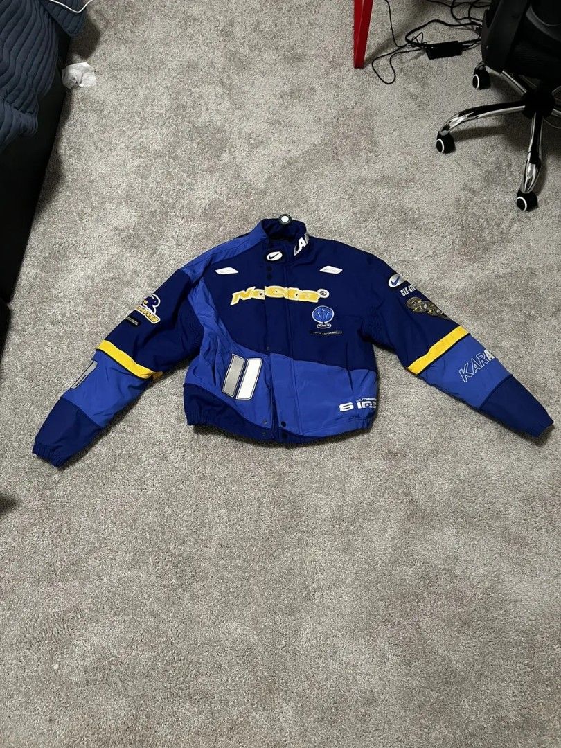 Nike x NOCTA x L'ART Racing (Category: Coats, Jackets and Outerwear) located in Makati City. Submitted by stryan (Listing ID 1396432947, Image 1). Description: Condition: 10/10 no discoloration or any scratches, wore it once -Size: Small S (for 5'2"-5'5" Thin to Toned build body only that weighs 50kg to 58kg) Chest: 92 cm Waist: 78 cm Hip: 96 cm cm(its on asian sizing so expect it to be a bit small than the american size clothings) BODY 100% COTT