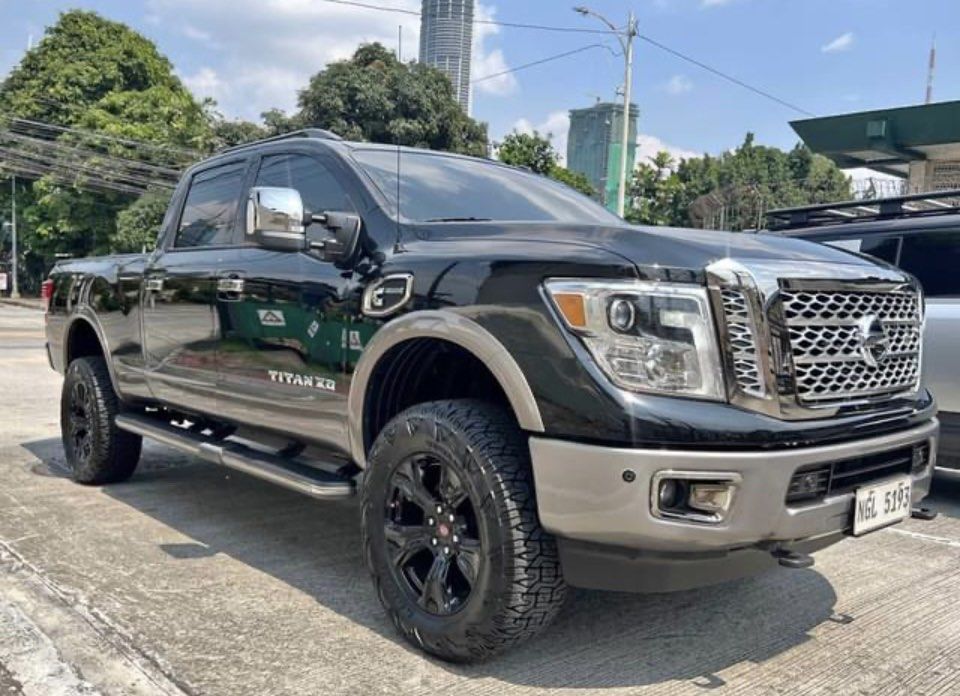 Nissan Titan Platinum Reserved Auto (Category: Used Cars) located in Quezon City. Submitted by vincelf (Listing ID 1396322158, Image 1). Description: 2019 Nissan Titan Platinum Reserve 5.6Liters Turbo Diesel V8 Cummins Engine 7-Speed Automatic Transmission 4x4, 390-Horsepower Top of the Line 1st Own, Color Black 2-Toned 13TKM Only, All Original Top Condition with ABS, Curtain Airbags Touchscreen Head Unit + MMi Command System Parking Sensors + Ca