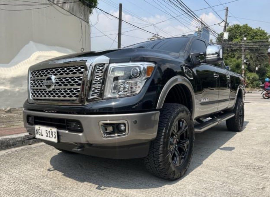 Nissan Titan Platinum Reserved Auto (Category: Used Cars) located in Quezon City. Submitted by vincelf (Listing ID 1396322158, Image 2). Description: 2019 Nissan Titan Platinum Reserve 5.6Liters Turbo Diesel V8 Cummins Engine 7-Speed Automatic Transmission 4x4, 390-Horsepower Top of the Line 1st Own, Color Black 2-Toned 13TKM Only, All Original Top Condition with ABS, Curtain Airbags Touchscreen Head Unit + MMi Command System Parking Sensors + Ca