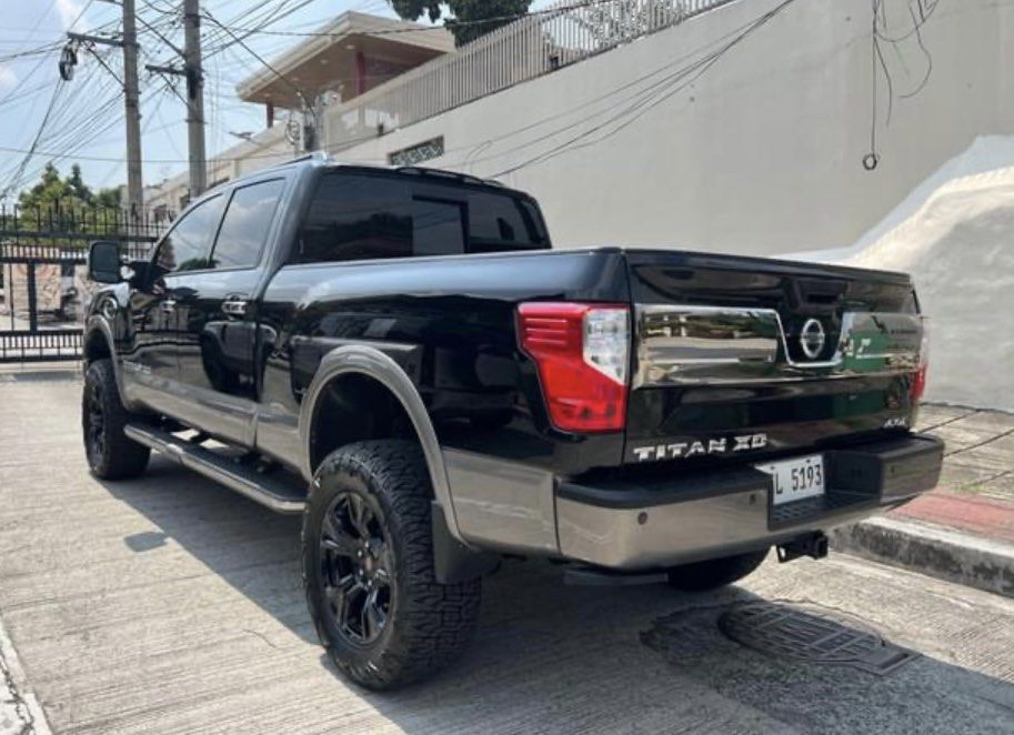 Nissan Titan Platinum Reserved Auto (Category: Used Cars) located in Quezon City. Submitted by vincelf (Listing ID 1396322158, Image 3). Description: 2019 Nissan Titan Platinum Reserve 5.6Liters Turbo Diesel V8 Cummins Engine 7-Speed Automatic Transmission 4x4, 390-Horsepower Top of the Line 1st Own, Color Black 2-Toned 13TKM Only, All Original Top Condition with ABS, Curtain Airbags Touchscreen Head Unit + MMi Command System Parking Sensors + Ca