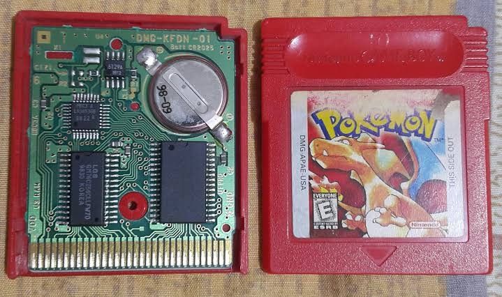 Pokemon Red Version Game Boy Cartridge (Category: Nintendo) located in Taguig. Submitted by retroretroretro (Listing ID 1396428489, Image 1). Description: - Pokemon Red Version cartridge for Game Boy - Features Charizard on the label - Red cartridge color - Includes DMG-APAE-USA marking - ESRB rated Everyone - Contains a battery - A classic for Game Boy collectors.