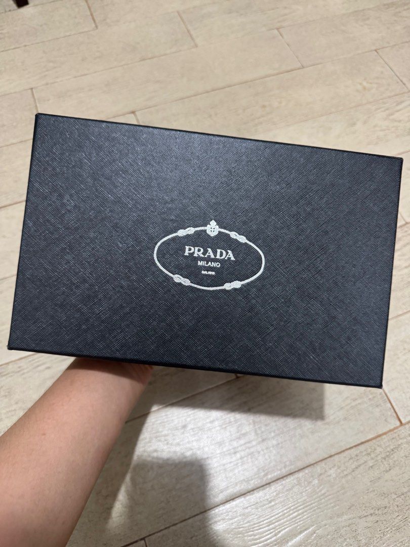 PRADA CLEO BAG (Category: Luxury Bags & Wallets) located in Quezon City. Submitted by glamfashionboutique (Listing ID 1396337062, Image 2). Description: PRADA CLEO BAG Can be worn as shoulder bag or kili bag Comes with shoulder strap, box, prada pouch Sourced from Japan Secondhand but like new Only once during event .