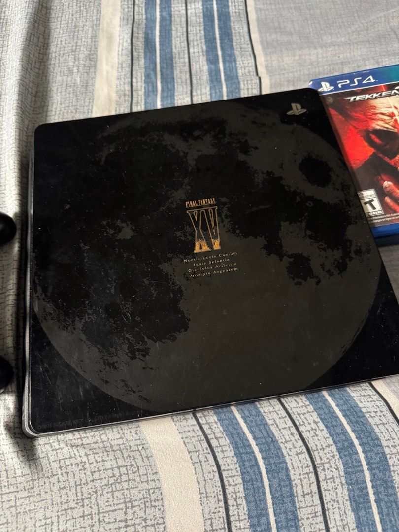 PS4 Final Fantasy 15 Slim 1TB + 2 controllers & 2 games (read description) (Category: PlayStation) located in Pasig City. Submitted by robbiseraphin (Listing ID 1396398894, Image 3). Description: Selling: PS4 Slim 1TB final fantasy edition - 1 v2 final fantasy original controller - 2 cd games (pipili kayo sa options ko) - complete wires - latest firmware - recently cleaned Freebie: 1 camo OEM controller pero working lang pag wired = 6k php.