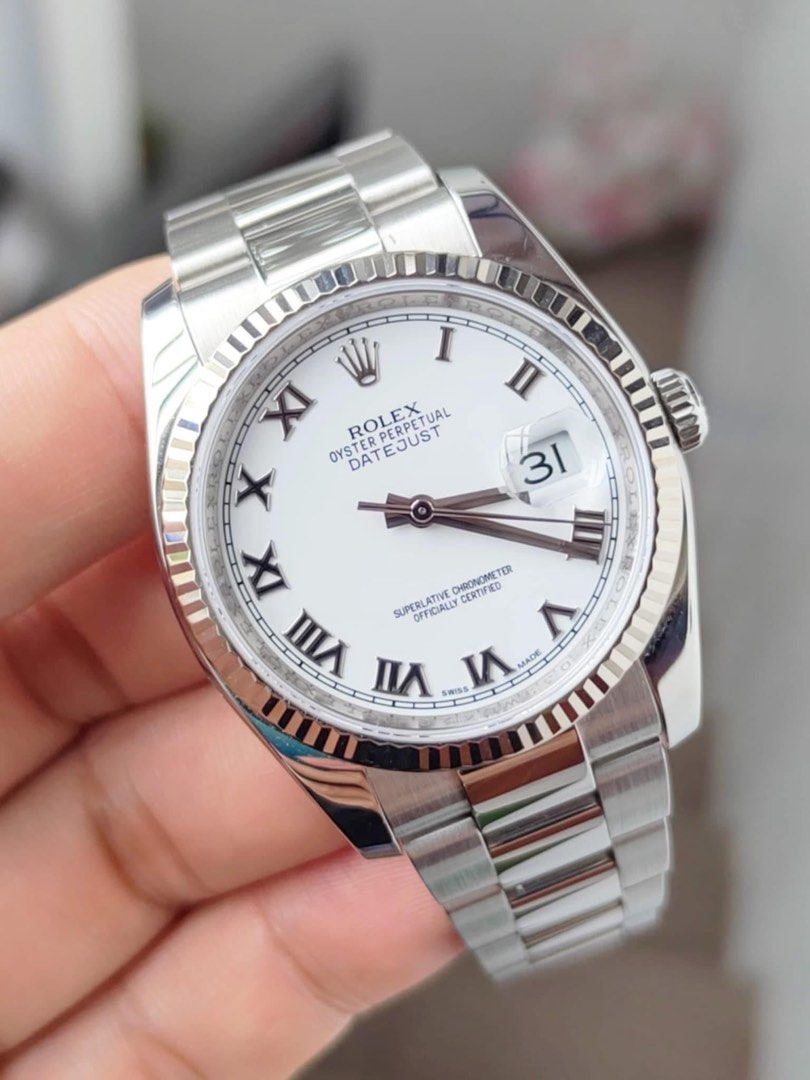 Rolex Oyster Perpetual Datejust (Category: Luxury Watches) located in Marikina City. Submitted by theauthenticph (Listing ID 1396438053, Image 1). Description: 2016 ROLEX DATEJUST 36 ROMAN DIAL (116234) Complete Set White Gold Flutted Bezel Super Oyster Steel Bracelet - Rolex Oyster Perpetual Datejust - White dial with Roman numeral hour markers - Date display at 3 o'clock - Stainless steel fluted bezel - Stainless steel bracelet - Classic and ti