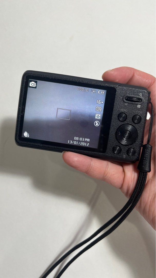 Samsung Digital Camera with 5x Zoom Lens DV100 (Category: Cameras) located in Quezon City. Submitted by hallodu (Listing ID 1396285685, Image 2). Description: - Samsung digital camera - 5x zoom lens - Front LCD screen - Black body - Includes wrist strap - Please see photos for damages - Charging port does not work so you have to charge the battery with an external battery charger - Can give battery charger for free - Zoom in/out button does not w