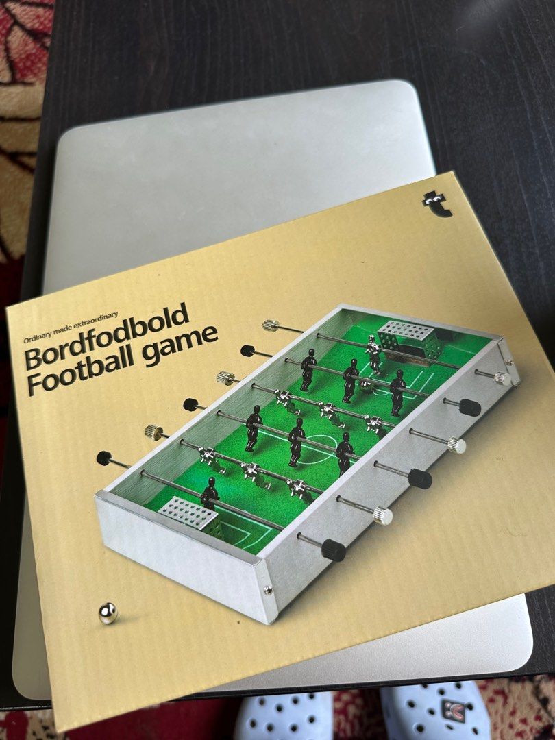 Small Fusball Game (Category: Board Games & Puzzles) located in Mandaluyong City. Submitted by thingsrandom (Listing ID 1396307910, Image 1). Description: - Miniature Bordfodbold foosball game - Comes in original box rfs: not being used.