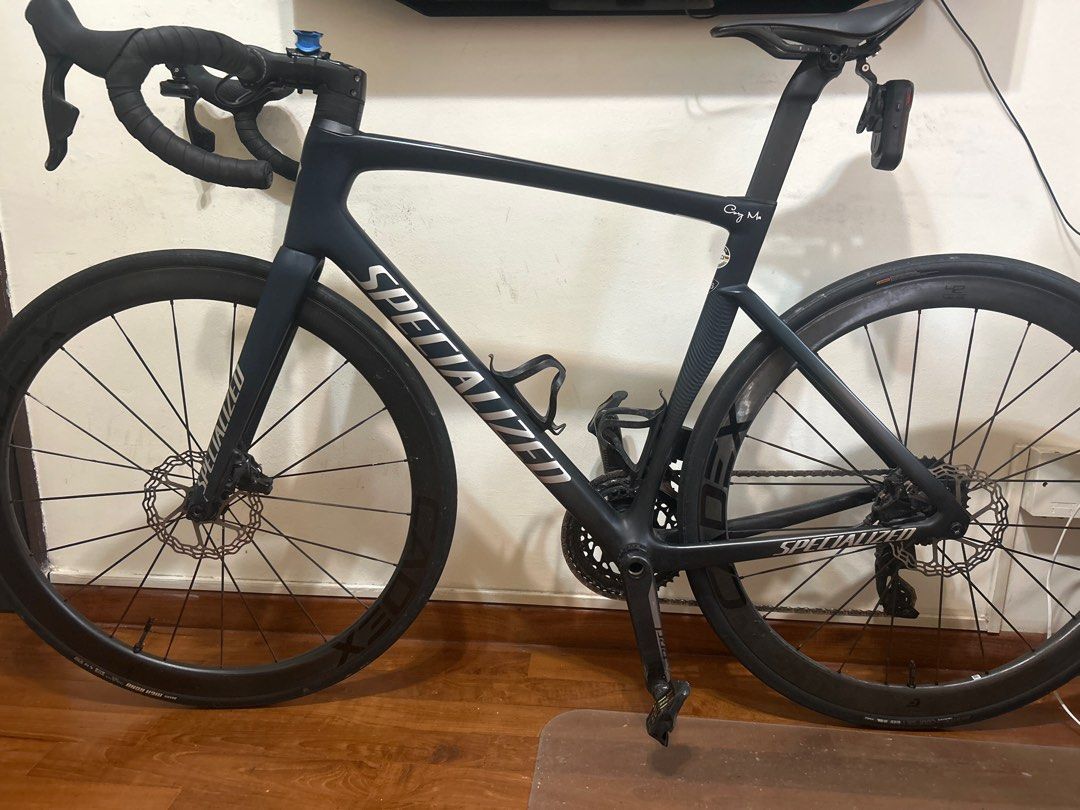 Specialized Tarmac SL7 - Size 56 (Category: Bicycles) located in Singapore. Submitted by cory.ma-29064 (Listing ID 1396385201, Image 1). Description: - Specialized Tarmac SL7 road bike - Size 56 frame - SRAM RED Power Meter crankset 48/35t - SRAM Force Cassette 10-33t - SRAM Rival Groupset - Full set of titanium bolts installed on the bike. - Cadex 42 Wheelset - Includes Look pedals - Includes Black Inc bottle cages - Well-maintained and ready to