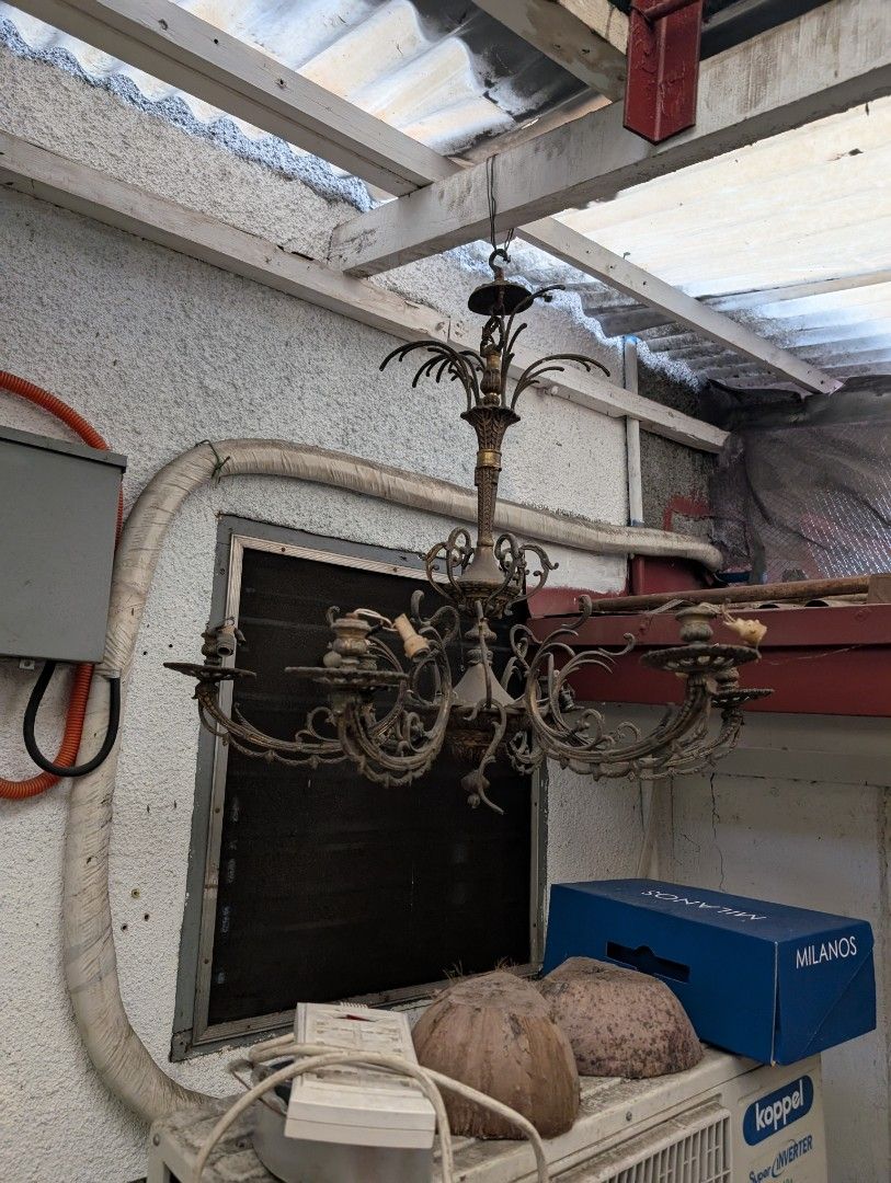 Vintage Chandelier Antique Brass (Category: Lighting) located in Makati City. Submitted by vish37 (Listing ID 1396323500, Image 1). Description: - Antique chandelier - Features multiple arms - Decorative design - Made of metal brass - Vintage aesthetic - Suspended from the ceiling just needs wiring and bulbs and polishing .