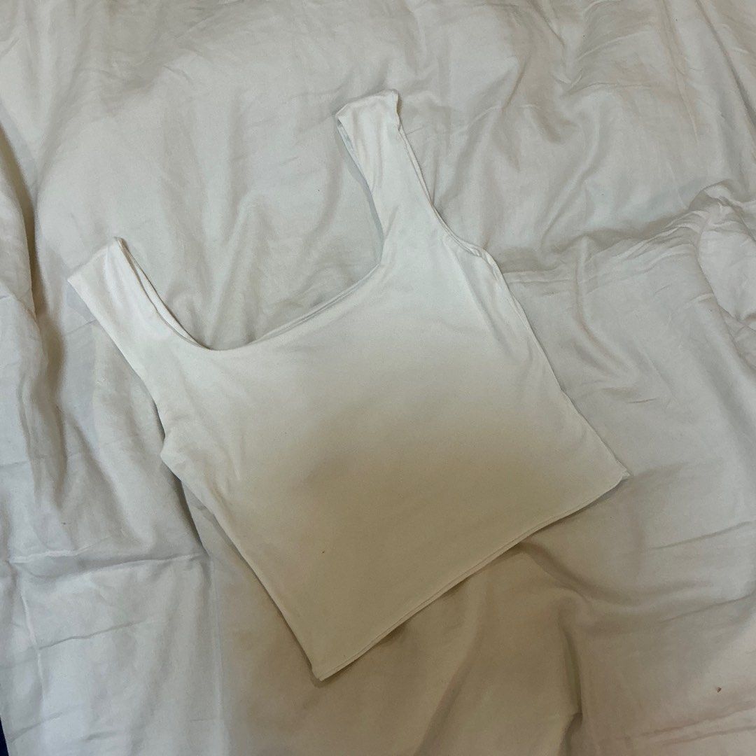 White Tank Top (Category: Sleeveless) located in Pasay City. Submitted by limbies8 (Listing ID 1396411859, Image 1). Description: .