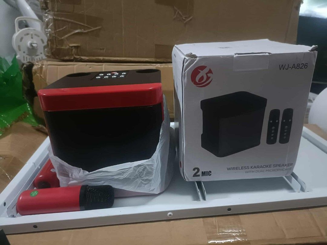 WJ-A826 Wireless Karaoke Speaker (Category: Soundbars, Speakers & Amplifiers) located in Malabon City. Submitted by granmerlencagayandeoro (Listing ID 1396440857, Image 3). Description: - Wireless karaoke speaker - Model: WJ-A826 - Color: Black and Red - Includes two microphones - Complete set, ready to use.