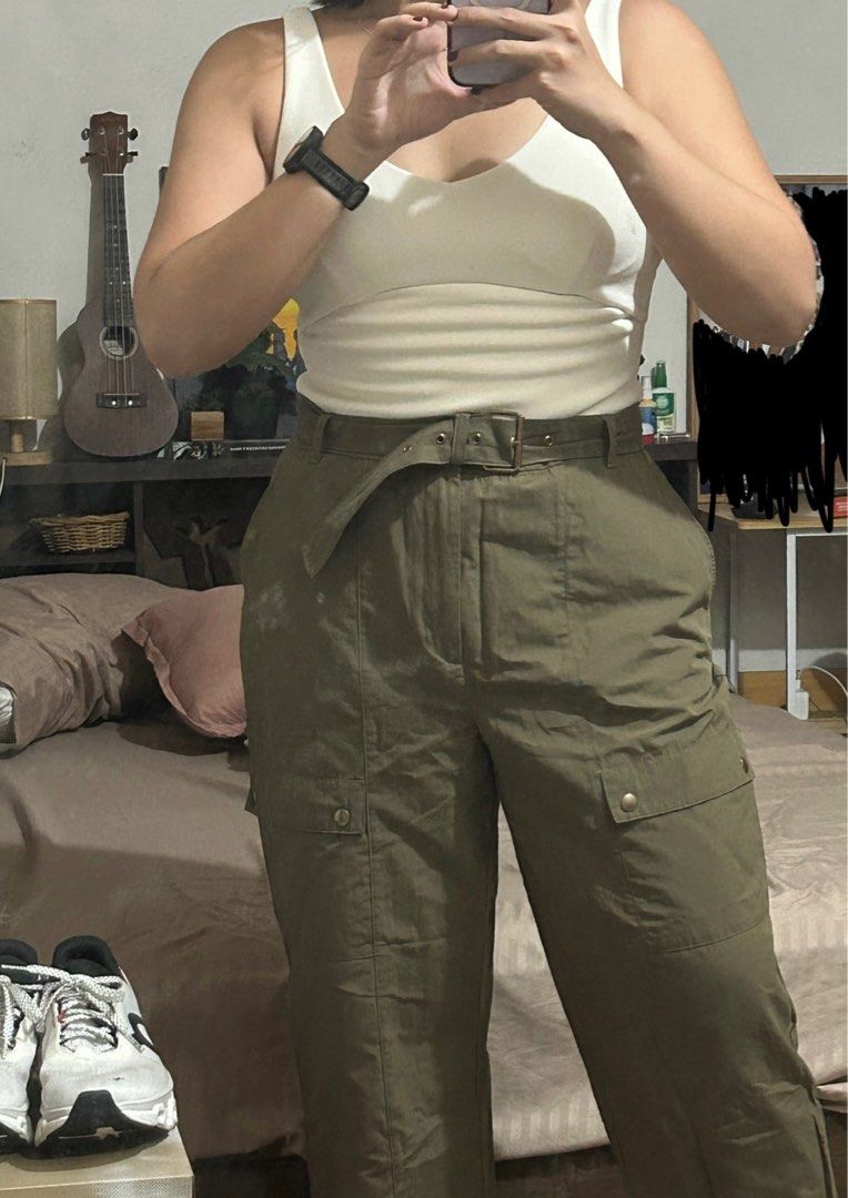 Zara Cargo Pants with Belt (Category: Jeans) located in Makati City. Submitted by declutterwjn_ (Listing ID 1396460101, Image 3). Description: - Zara olive green cargo pants - Includes matching belt with buckle - Relaxed fit - Features pockets and button details - Bought for ₱2k at actual Zara store - Used just once.