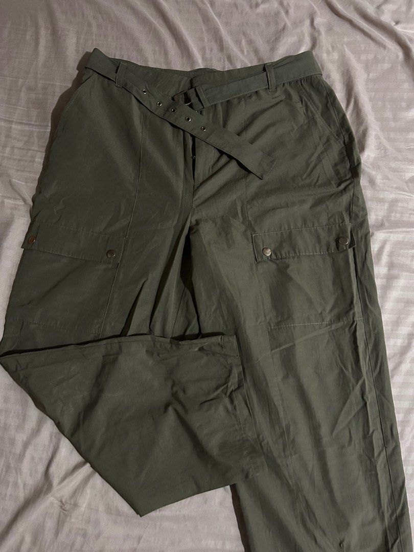 Zara Cargo Pants with Belt (Category: Jeans) located in Makati City. Submitted by declutterwjn_ (Listing ID 1396460101, Image 2). Description: - Zara olive green cargo pants - Includes matching belt with buckle - Relaxed fit - Features pockets and button details - Bought for ₱2k at actual Zara store - Used just once.