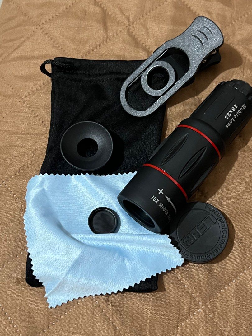18X Mobile Lens - Complete Inclusions (Category: Lens & Kits) located in Manila. Submitted by woniethecat (Listing ID 1396641098, Image 2). Description: - 18X Mobile Lens for digital cameras and phones - Includes: Lens, Clip, Cleaning Cloth, Pouch, and Lens Caps - RFS: decluttering; never used -loc: pasay -mod: lalamove only -mop: gcash -sf to be handled by buyer can send actual photos when zoomed in! .