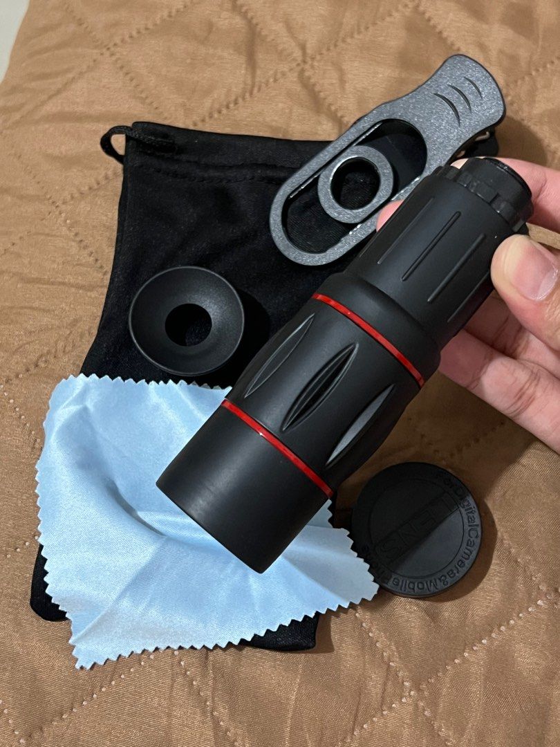 18X Mobile Lens - Complete Inclusions (Category: Lens & Kits) located in Manila. Submitted by woniethecat (Listing ID 1396641098, Image 3). Description: - 18X Mobile Lens for digital cameras and phones - Includes: Lens, Clip, Cleaning Cloth, Pouch, and Lens Caps - RFS: decluttering; never used -loc: pasay -mod: lalamove only -mop: gcash -sf to be handled by buyer can send actual photos when zoomed in! .