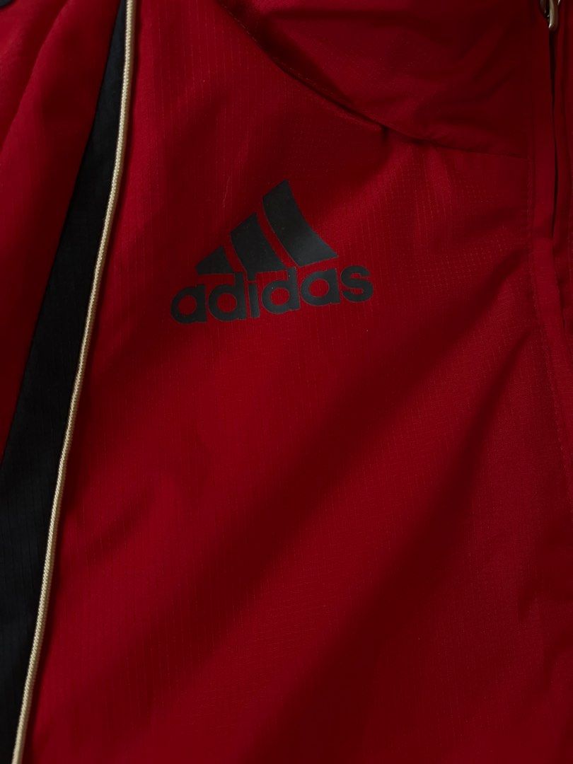 Adidas Liverpool FC Jacket (Category: Coats, Jackets and Outerwear) located in Baguio. Submitted by nickguard (Listing ID 1396487760, Image 2). Description: - Maroon Adidas jacket - Features the Liverpool FC logo and Carlsberg branding - Full zip and hood - Adidas logo on the chest, back, and zipper - Mesh lining - L 31in , W 29in - Detachable hood.
