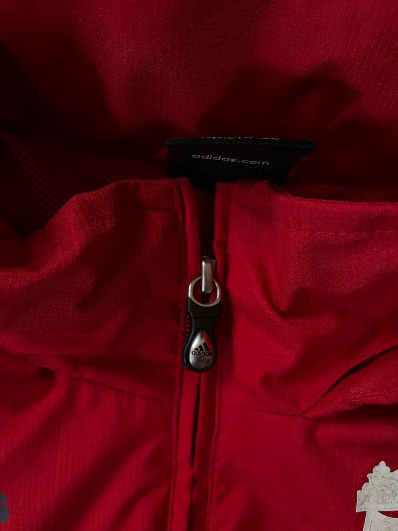 Adidas Liverpool FC Jacket (Category: Coats, Jackets and Outerwear) located in Baguio. Submitted by nickguard (Listing ID 1396487760, Image 3). Description: - Maroon Adidas jacket - Features the Liverpool FC logo and Carlsberg branding - Full zip and hood - Adidas logo on the chest, back, and zipper - Mesh lining - L 31in , W 29in - Detachable hood.