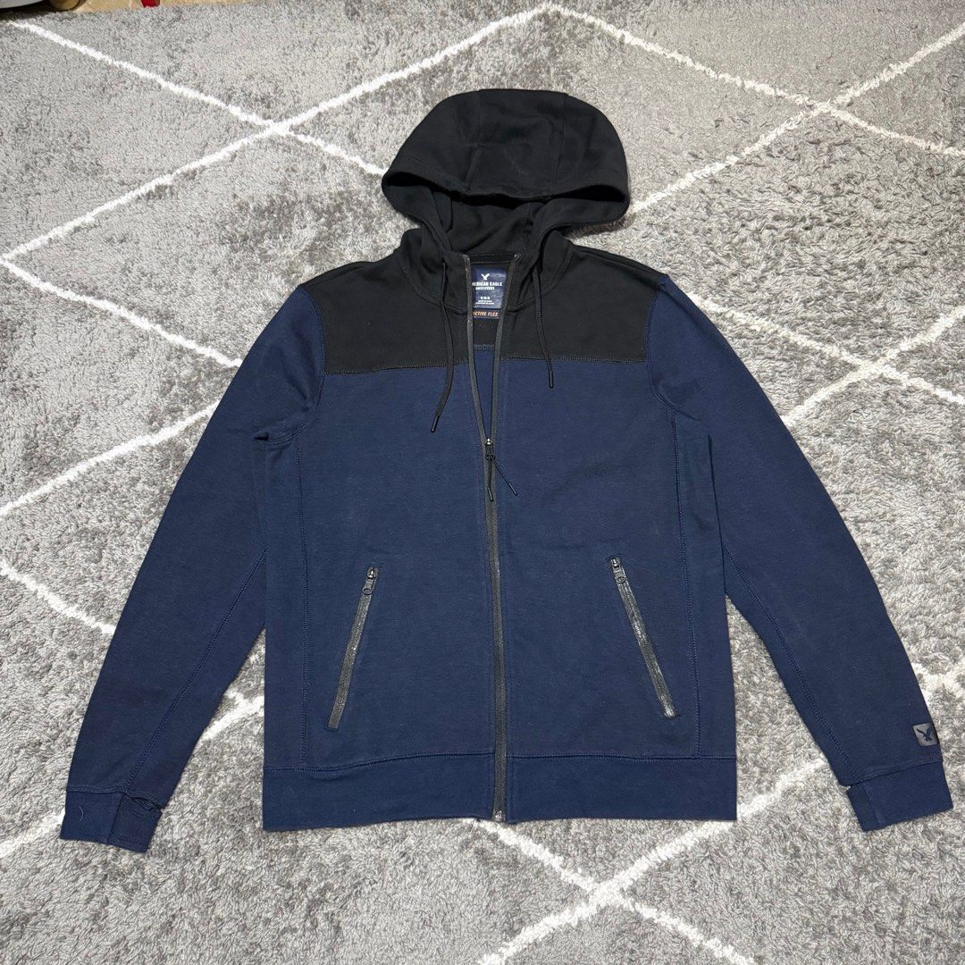 American Eagle Outfitters - Active Flex - Hoodie Jacket (Category: Activewear) located in Paranaque City. Submitted by vic.store.sy (Listing ID 1396575886, Image 1). Description: American Eagle Outfitters - Active Flex - Hoodie Jacket Color: Blue / Black Size: Medium Length: 27” Width: 21” Shoulders: 18” Arms: 26” Issue: none MOP: GCash Shipping fee by buyer.