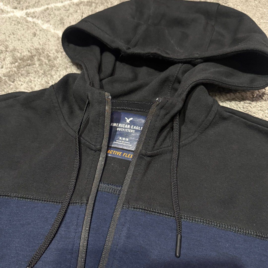 American Eagle Outfitters - Active Flex - Hoodie Jacket (Category: Activewear) located in Paranaque City. Submitted by vic.store.sy (Listing ID 1396575886, Image 3). Description: American Eagle Outfitters - Active Flex - Hoodie Jacket Color: Blue / Black Size: Medium Length: 27” Width: 21” Shoulders: 18” Arms: 26” Issue: none MOP: GCash Shipping fee by buyer.