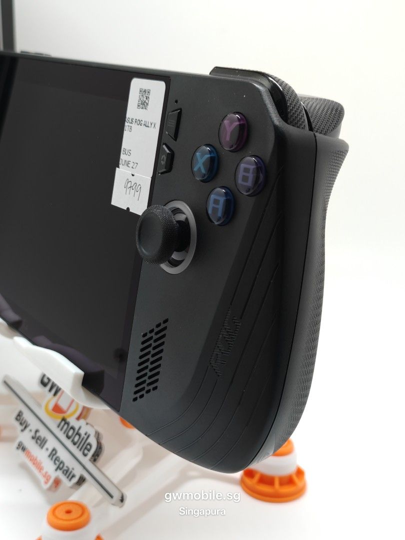 Asus ROG Ally X 1TB 9799 (Category: Others) located in Singapore. Submitted by gwmobile.sg (Listing ID 1396571058, Image 2). Description: "AA🌟𝐁𝐞𝐬𝐭 𝐕𝐚𝐥𝐮𝐞 𝐌𝐨𝐛𝐢𝐥𝐞𝐬 & 𝐓𝐚𝐛𝐥𝐞𝐭🌟 Z1 extreme CPU full set with charger • 𝐒𝐜𝐫𝐞𝐞𝐧 𝐂𝐨𝐧𝐝𝐢𝐭𝐢𝐨𝐧: No Scratches • 𝐁𝐨𝐝𝐲 𝐂𝐨𝐧𝐝𝐢𝐭𝐢𝐨𝐧: very good No Scratches • 𝐁𝐚𝐭𝐭𝐞𝐫𝐲 𝐇𝐞𝐚𝐥𝐭𝐡: good condition * Free One month shop warranty * 100% ALL Original parts * Phone is in