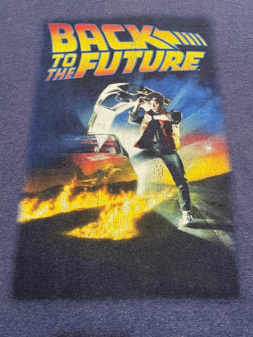 Back To The Future Navy Blue Shirt (Category: Tshirts & Polo Shirts ) located in Bay. Submitted by thrift2memorylane (Listing ID 1396586827, Image 3). Description: Back To The Future Navy Blue Shirt Color rate: 9/10 Condition: Good Size: XL on tag (31.5 x 24 in) 300 + sf Location: Laguna Dm Note: Color may vary due to camera and lighting.