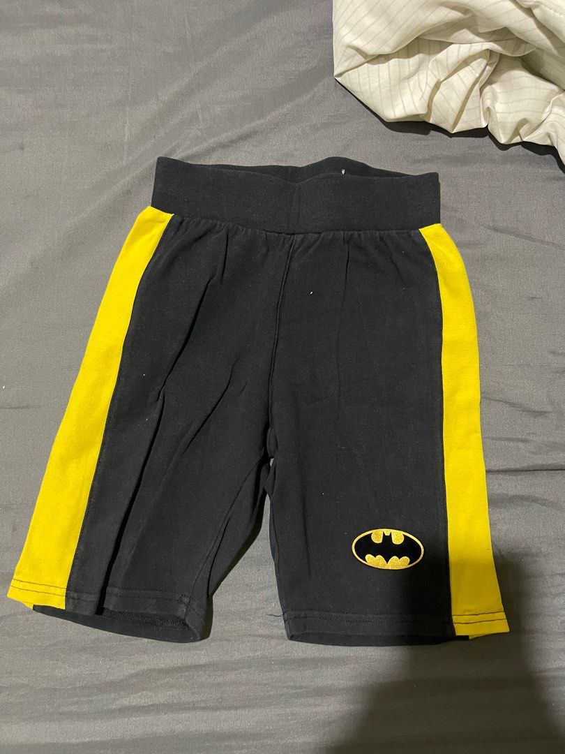 Batman Shorts - Size M (Category: Babies & Kids Fashion) located in Manila. Submitted by _eahmczz (Listing ID 1396657893, Image 1). Description: - Black shorts, size M - Yellow side stripes - Batman logo - Two back pockets with yellow lining and Batman logo - Black waistband.