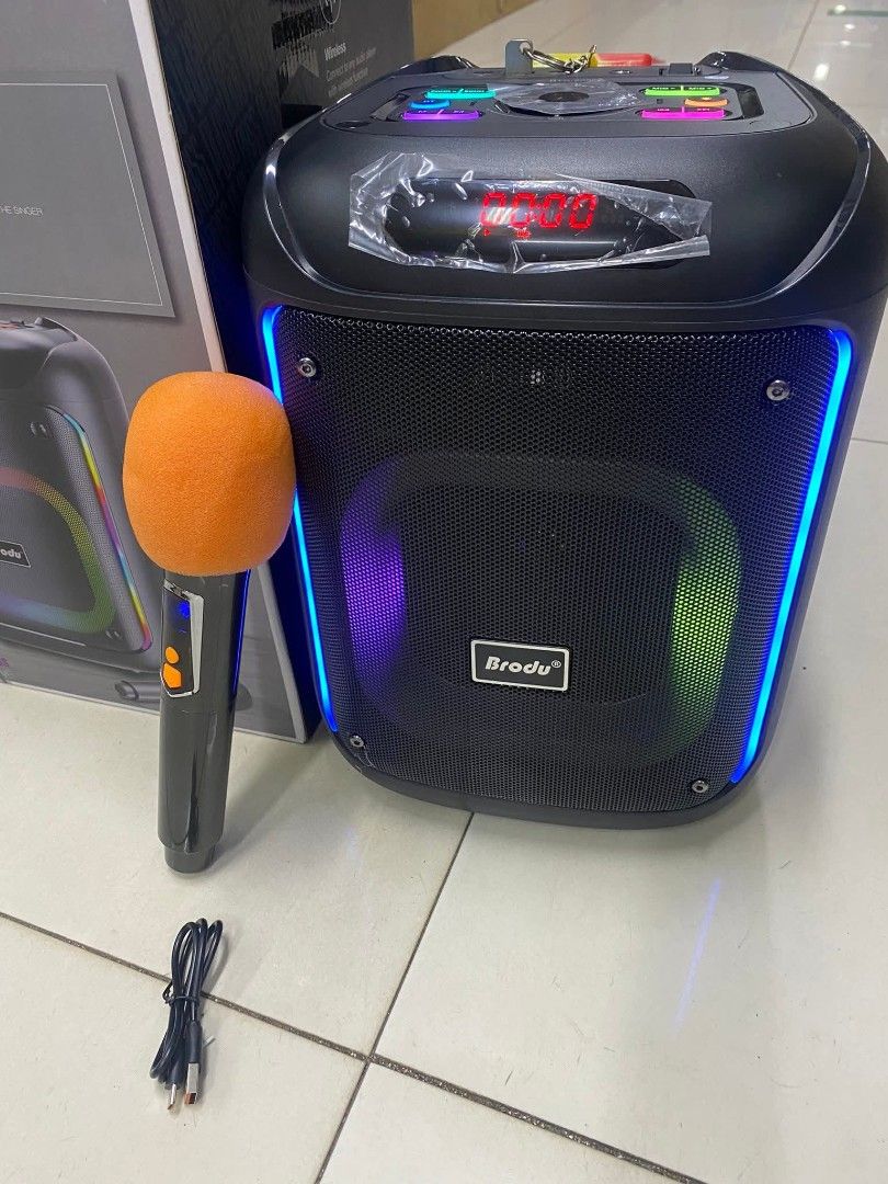Brodu Karaoke Box with Microphone (Category: Soundbars, Speakers & Amplifiers) located in Manila. Submitted by lyfrancois14 (Listing ID 1396534205, Image 3). Description: - Brodu Karaoke Box - 6.5-inch speaker - Includes microphone - Colorful LED lights - Portable design - Comes with charging cable Brudo BTS-2286 6.5" IKARAOKE BOX Professional System Bluetooh Speaker With rechargeable wireless Mic.