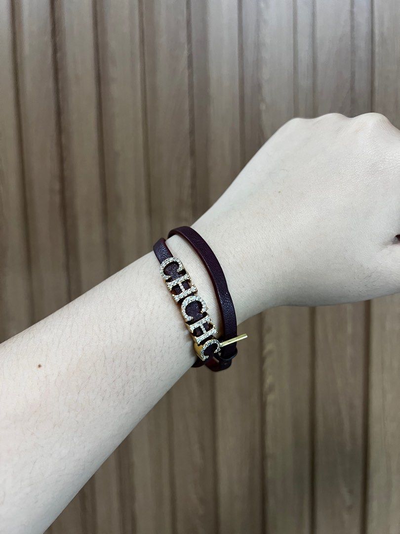 Carolina Herrera Deep Red Wrap Around Bracelet (Category: Bracelets) located in Cainta. Submitted by chainm (Listing ID 1396474704, Image 2). Description: Best for wide wrists No original box included but will provide alternative case.
