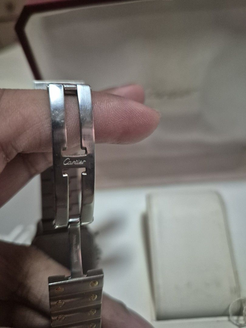 Cartier Santos 100 Chronograph Watch (Category: Luxury Watches) located in Roxas City. Submitted by bosespeaker (Listing ID 1396495477, Image 3). Description: - RARE ⌚️Discontinued model. - Authentic Cartier Santos 100 Chronograph - Silver and gold-tone stainless steel bracelet and case - White dial with Roman numeral hour markers - Chronograph sub-dials - Includes original box, papers, and tag - Cartier logo on clasp - Part of my collection. Bou