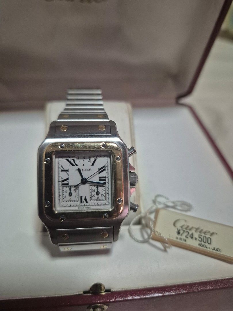 Cartier Santos 100 Chronograph Watch (Category: Luxury Watches) located in Roxas City. Submitted by bosespeaker (Listing ID 1396495477, Image 2). Description: - RARE ⌚️Discontinued model. - Authentic Cartier Santos 100 Chronograph - Silver and gold-tone stainless steel bracelet and case - White dial with Roman numeral hour markers - Chronograph sub-dials - Includes original box, papers, and tag - Cartier logo on clasp - Part of my collection. Bou