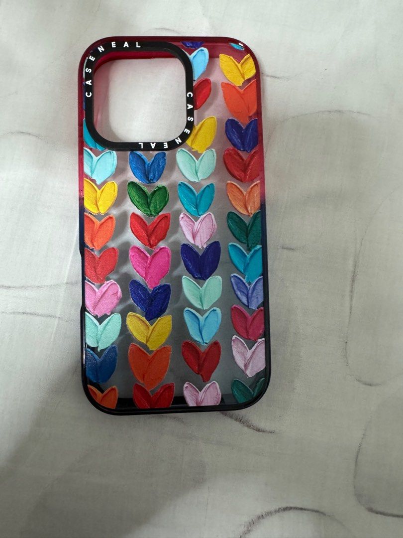 Casetify iPhone Case with Heart Design (Category: Cases & Sleeves) located in Singapore. Submitted by ml69690 (Listing ID 1396475768, Image 1). Description: - Casetify phone case - Features a colorful heart design - Designed for a specific iPhone model - Provides protection - Adds artistic flair.
