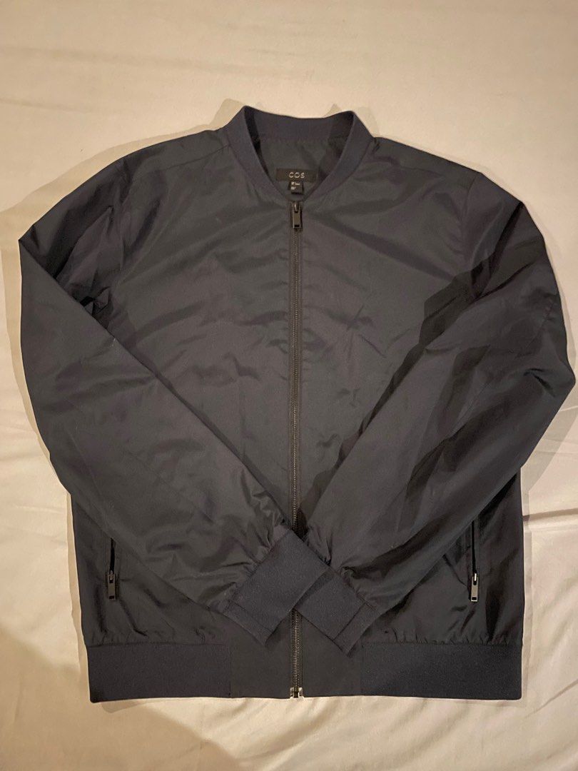 COS Men Bomber Jacket (Navy Blue) (Category: Coats, Jackets and Outerwear) located in Tarlac. Submitted by johnjohnjohn23 (Listing ID 1396480227, Image 1). Description: Free shipping Worn 5 times maximum. Needs washing only. See photos for dimensions Size S fit M.