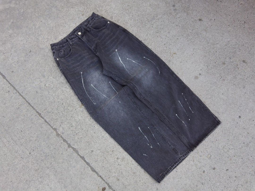 COURSEMYE Black Denim Jeans with Paint Splatter (Category: Jeans) located in Davao. Submitted by afforda_thrift.ph (Listing ID 1396521789, Image 1). Description: - COURSEMYE black denim jeans - Baggy - Button closure - White paint splatter details on front - Size M - Classic and versatile.