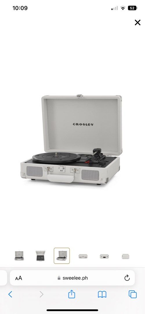 Crosley Cruiser Deluxe Portable Turntable (Category: Portable Music Players) located in Orani. Submitted by bmsnts (Listing ID 1396483465, Image 2). Description: - Crosley Cruiser Deluxe portable turntable. - Stylish white design with silver accents. - Plays vinyl records. - Built-in speaker system. - Portable with a convenient handle. - naka stock lang sa bahay kasi -negotiable.