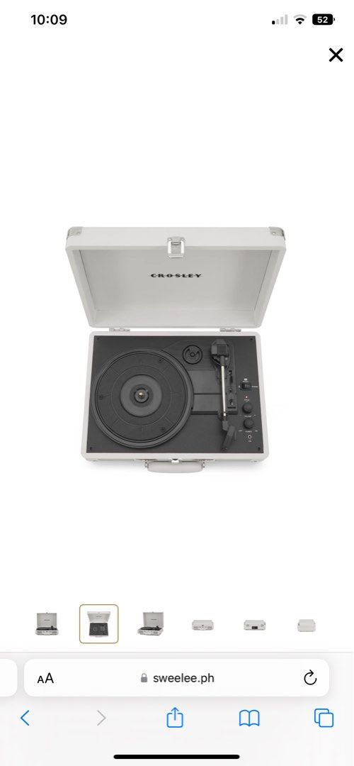 Crosley Cruiser Deluxe Portable Turntable (Category: Portable Music Players) located in Orani. Submitted by bmsnts (Listing ID 1396483465, Image 3). Description: - Crosley Cruiser Deluxe portable turntable. - Stylish white design with silver accents. - Plays vinyl records. - Built-in speaker system. - Portable with a convenient handle. - naka stock lang sa bahay kasi -negotiable.