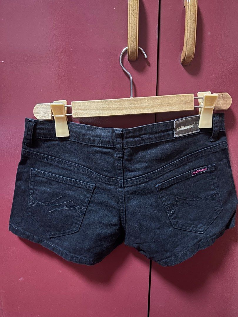 Dollhouse Black Denim Shorts (Category: Shorts) located in Manila. Submitted by AAA09876 (Listing ID 1396621134, Image 1). Description: - Size: 29 inches - Dollhouse black denim shorts - Low-rise waist - Classic five-pocket design - Button and zipper closure - Unique curved back pocket design - Perfect for casual wear.