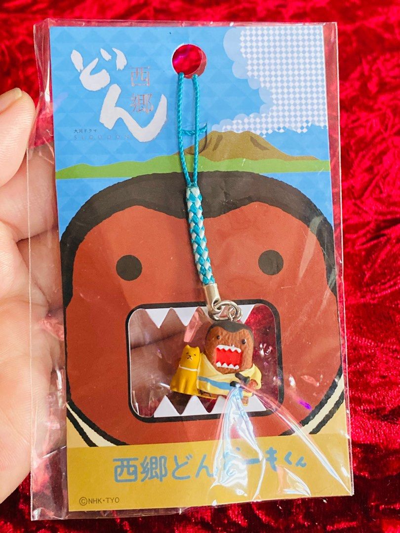 Domo-kun Keychain 250 (Category: Character Goods) located in Zamboanga. Submitted by kawaii_omocha_est2020 (Listing ID 1396638846, Image 1). Description: - Domo-kun keychain - Features Domo-kun in a yellow outfit - Includes a small yellow cat - Attached to a blue and white braided strap - Packaging with Japanese text - Features the NHK-TYO logo - Still in original packaging ✅Mine now/ Pay now ✅ Please scan all photos for more details. ✅ Manage yo