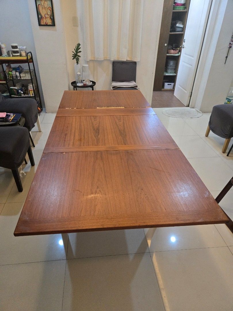 Extendable Dining Table (Category: Tables & Sets) located in Paranaque City. Submitted by krishapw (Listing ID 1396489323, Image 2). Description: Slightly negotiable. Selling As Is. Well loved extendable dining table. Can be used in 3 lengths Original Length- 138cm One Side Extended- 198cm Two Side Extended- 258cm width is 90cm, height is 70cm. Peeling veneer. bought from an IG furniture reseller in 2020 for 13k. RFS- bought new table already. vi