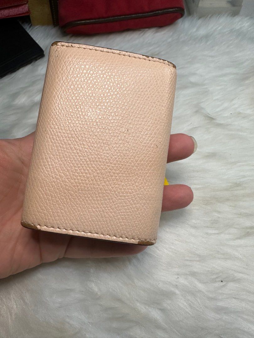 fendi micro wallet (Category: Luxury Bags & Wallets) located in Antipolo. Submitted by ambercs (Listing ID 1396579341, Image 3). Description: authentic fendi wallet small and compact 3-4 card slots 1 coin compartment very cute and elegant has minor rubs ( retouch of the sides can do) wallet only; no inclusions add + 500 for the box .