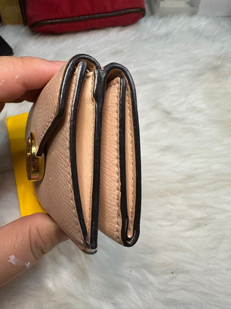 fendi micro wallet (Category: Luxury Bags & Wallets) located in Antipolo. Submitted by ambercs (Listing ID 1396579341, Image 2). Description: authentic fendi wallet small and compact 3-4 card slots 1 coin compartment very cute and elegant has minor rubs ( retouch of the sides can do) wallet only; no inclusions add + 500 for the box .