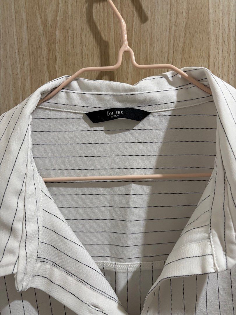 For Me Striped Button-Down Shirt (Category: Longsleeves) located in Balanga. Submitted by pmcgee (Listing ID 1396649111, Image 3). Description: - Brand: For Me (bought for 1k+) - Worn once, can pass as brand new - Style: White button-down shirt with thin black stripes - Features: Collared neckline, long sleeves with buttoned cuffs - Fit: Relaxed oversize - Material: Lightweight fabric .