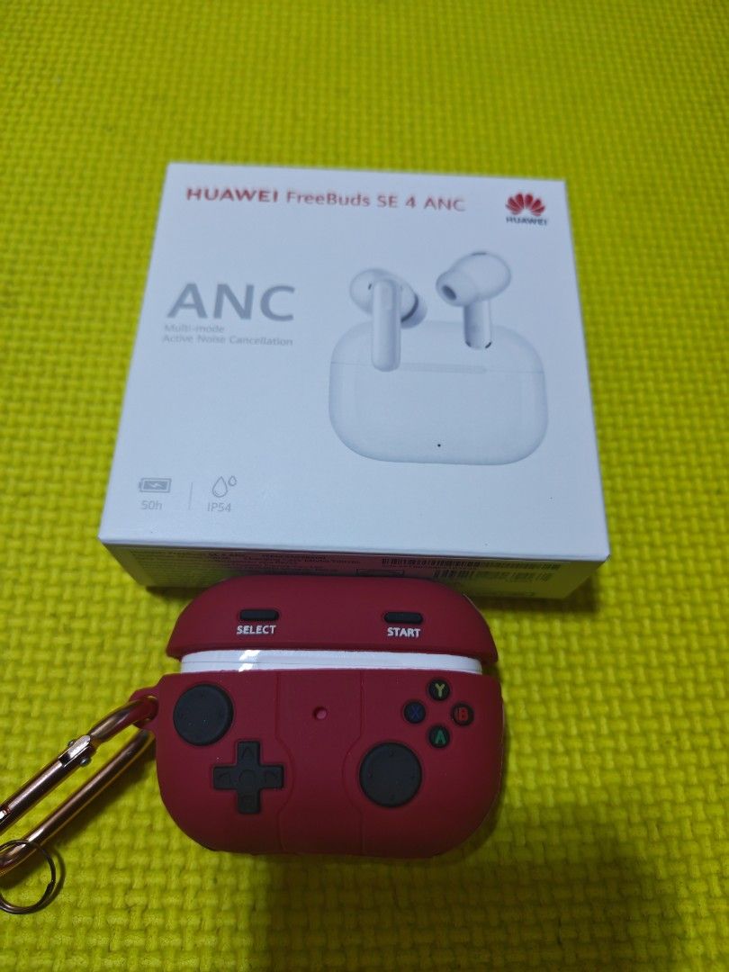 Huawei Freebuds SE 4 ANC with Case (Category: Earphones) located in Pasig City. Submitted by rilencer (Listing ID 1396478435, Image 1). Description: Used 2 weeks olds good as new - Huawei Freebuds SE 4 ANC earbuds - Stylish white earbuds - Eye-catching red game controller-style case - Integrated carabiner clip for easy carrying - Active Noise Cancellation (ANC) for immersive audio - Original box included - Box provides detailed product features.