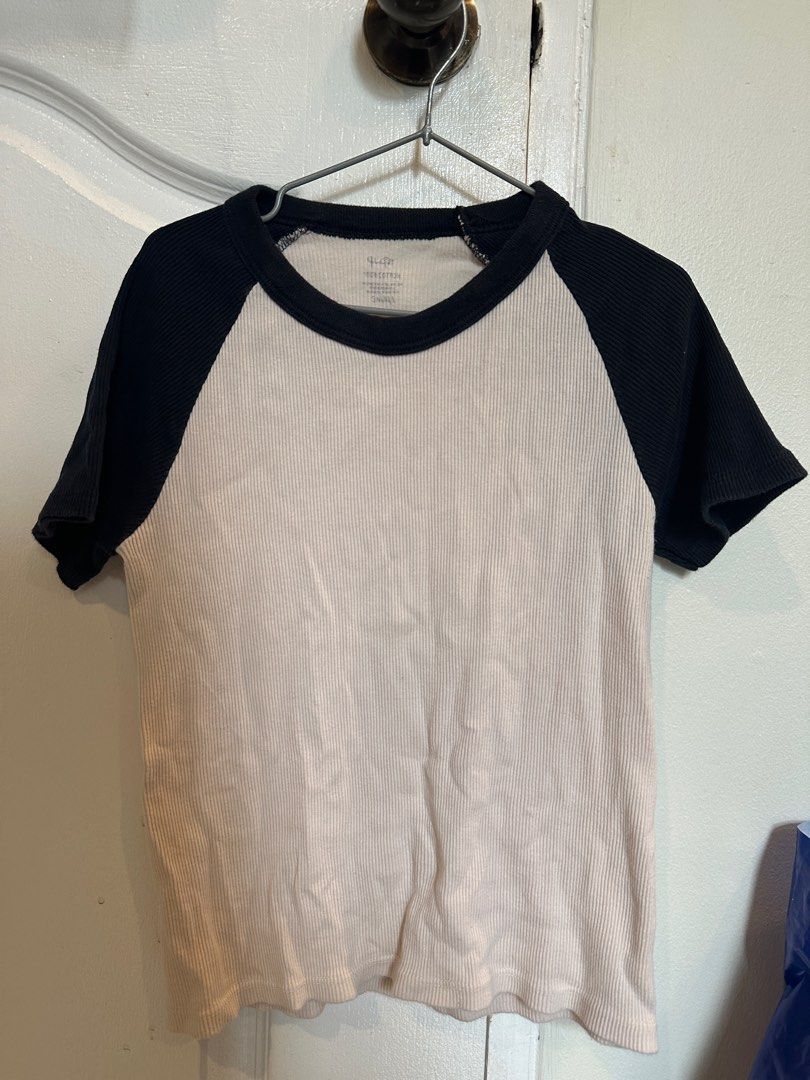 John Galt Baseball Tee from PACSUN (Category: Shirts) located in Manila. Submitted by cchaiprincess (Listing ID 1396505505, Image 1). Description: RFS: i don't wear it anymore - Price is negotiable - Brandy Melville baseball tee - Cream body with black sleeves - Ribbed texture - Tag visible - Perfect for everyday wear tags: brandy melville, clean girl, basic tee, lily rose depp, model off duty, chic, gets ba, esoteric baddies, bla bla bla, summer