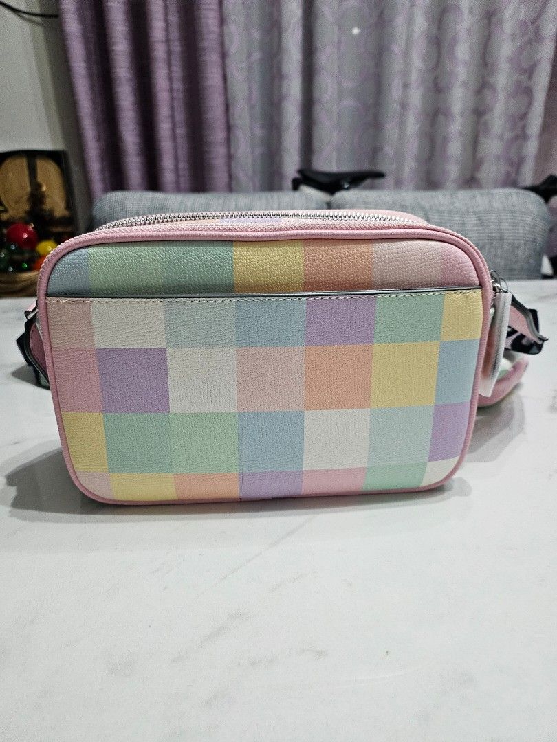 Karl Lagerfeld Crossbody Bag (Category: Cross-body Bags) located in Las Pinas. Submitted by waistnot (Listing ID 1396577018, Image 3). Description: - Karl Lagerfeld crossbody bag set - Features a colorful checkered pattern - Karl and Choupette graphics - Includes a crossbody bag and a small coin purse - Detachable strap with "PARIS" print - Perfect for carrying essentials in style.