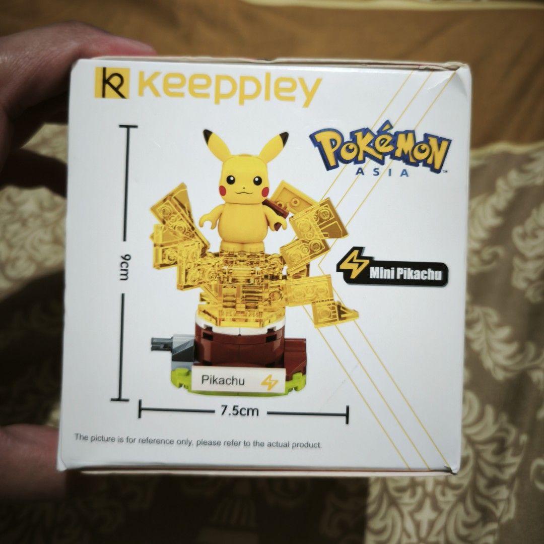 Keepley Pokemon Mini Pikachu Building Block (Category: Lego & Building Sets) located in Manila. Submitted by patrickbl69019 (Listing ID 1396662819, Image 1). Description: - Keepley Pokemon Mini Pikachu building block set. - Includes a Pikachu figure. - Features a gold-colored base. - Official licensed product from Pokemon Asia. - Contains 61 pieces. - Recommended for ages 6+. - Other Pokemon characters available in the series. Please read before 