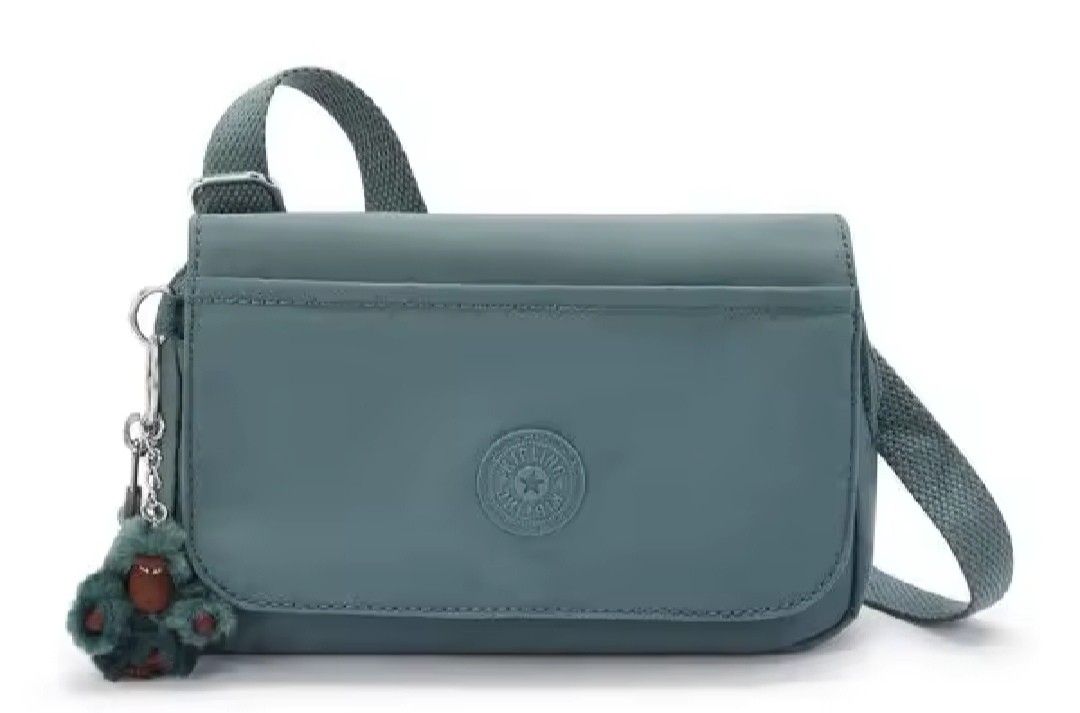 Kipling Averill Crossbody Bag Light Aloe (Category: Cross-body Bags) located in Davao. Submitted by jilly07 (Listing ID 1396519581, Image 1). Description: - Kipling Averill crossbody bag - Teal color - Adjustable strap - Flap closure - Includes Kipling monkey charm - Multiple interior compartments - Zipper closure - Kipling logo tag 👜 Brand new. Bought in Kipling Store, comes with tags and original packaging. ❌No COD/COP as I am a full time work