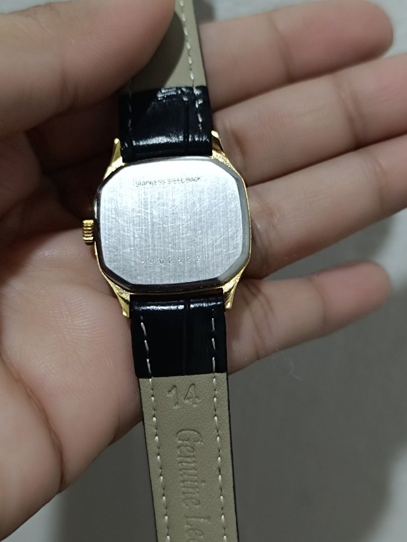 Longines Quartz Watch (Category: Luxury Watches) located in Quezon City. Submitted by maeclosetph (Listing ID 1396556390, Image 2). Description: - Longines quartz watch - Gold-toned rectangular dial - Black leather strap - Stainless steel back .